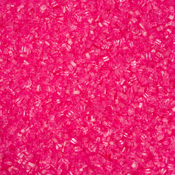 Cristales de azúcar rosa fuerte